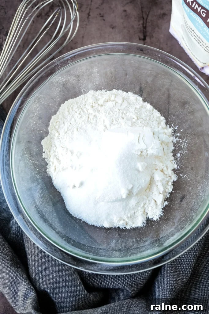 Cottage Cheese Pancakes are a tasty way to get more protein into your breakfast! Fluffy, protein packed pancakes that melt in your mouth! flour and baking powder in a bowl for pancakes