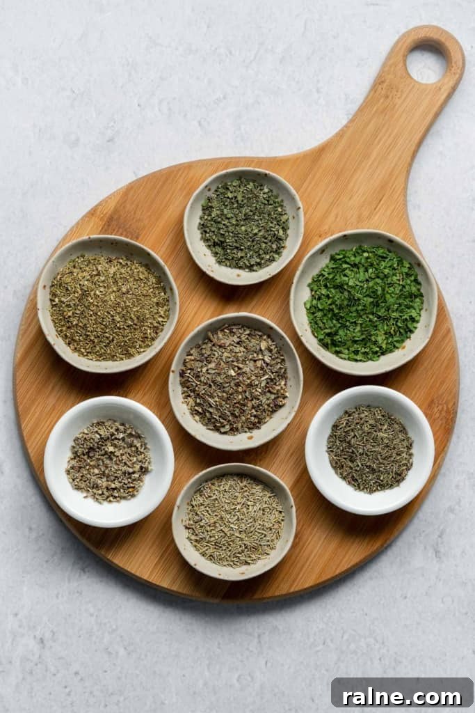Homemade Italian Seasoning Blend: Simple Recipe for Authentic Flavor 2 dried basil, marjoram, oregano, parsley, rosemary, thyme, and sage in bowls