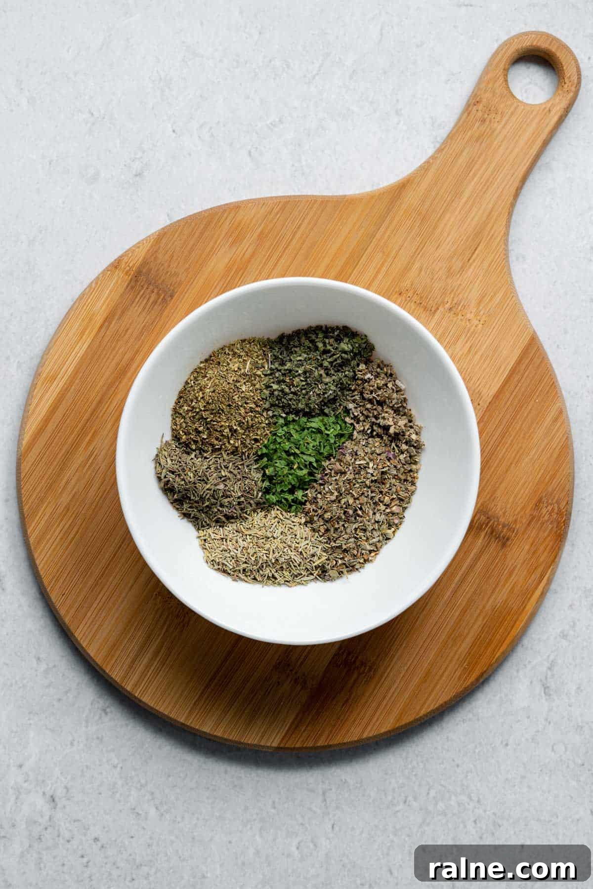 DIY Italian Seasoning Mix dried herbs in white bowl