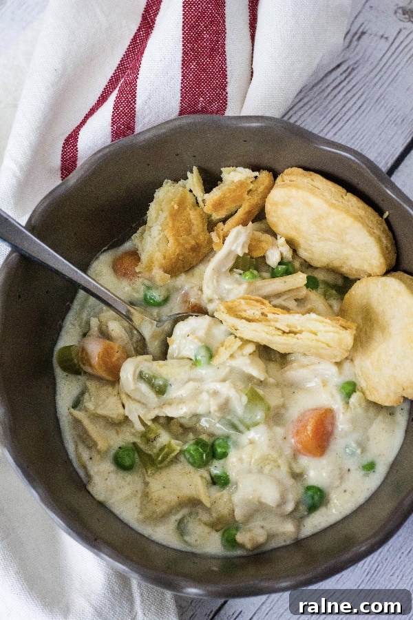 Instant Pot Chicken Pot Pie with Pie Crust or Biscuit Topping 4 brown bowl filled with chicken pot pie filling cooked in the Instant Pot and served with pie crust