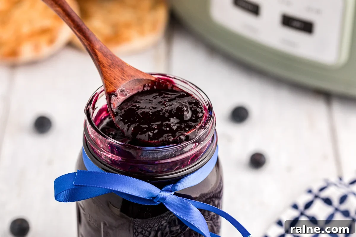 How to Make Homemade Blueberry Butter (Smooth & Spreadable) 6 Blueberry butter in a jar.