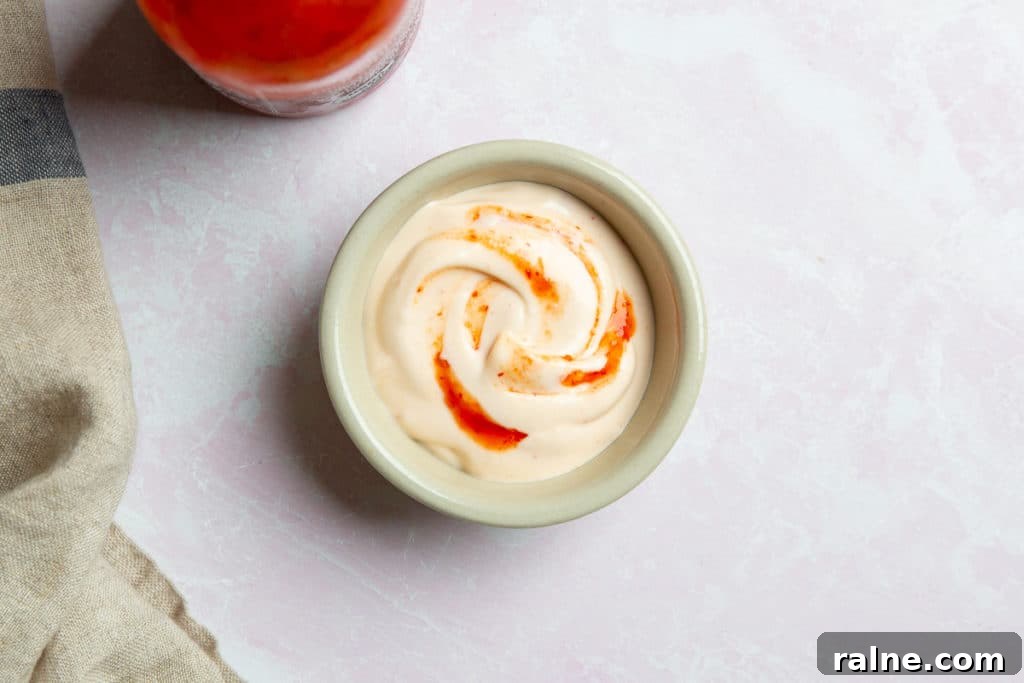 A small bowl of sriracha mayo.