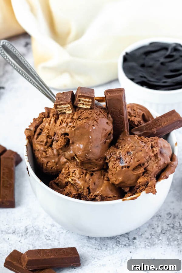 No-Churn Kit Kat Ice Cream no-churn chocolate ice cream loaded with chopped kit-kats and swirled with hot fudge sauce