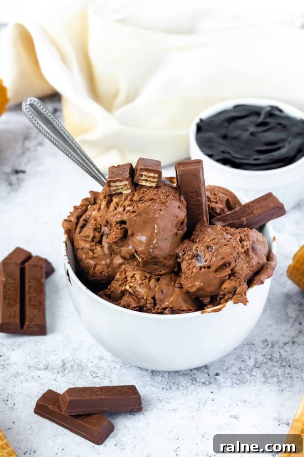 No-Churn Kit Kat Ice Cream no-churn chocolate ice cream loaded with chopped kit-kats and swirled with hot fudge sauce