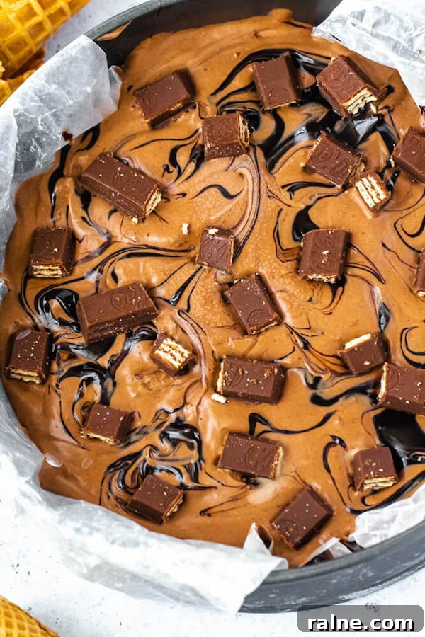 No-Churn Kit Kat Ice Cream no-churn chocolate ice cream loaded with chopped kit-kats and swirled with hot fudge sauce