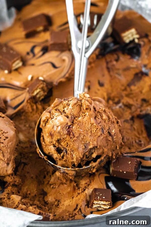 No-Churn Kit Kat Ice Cream no-churn chocolate ice cream loaded with chopped kit-kats and swirled with hot fudge sauce