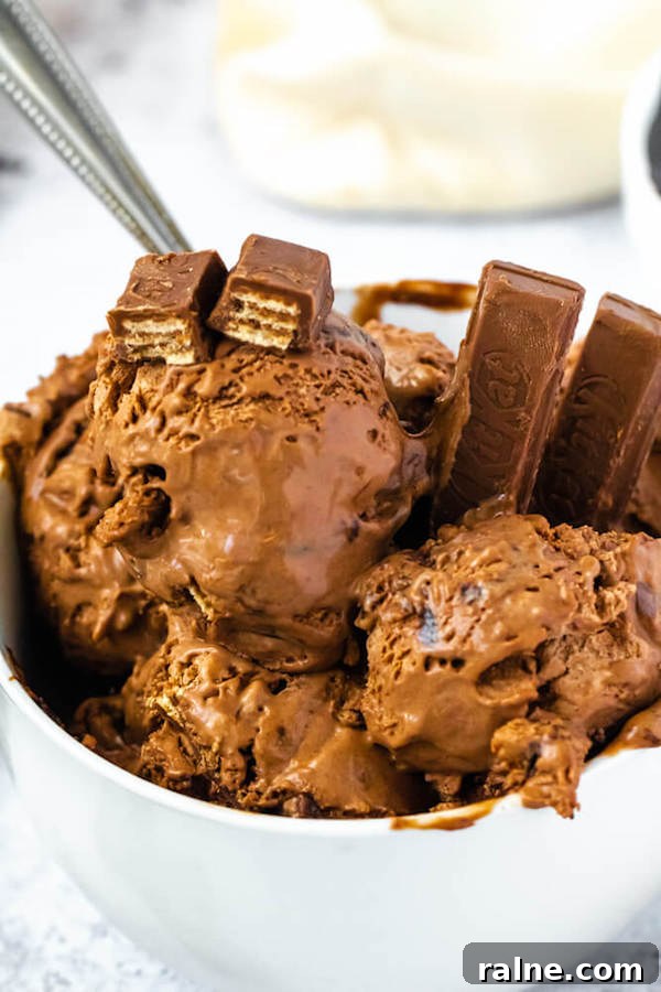 No-Churn Kit Kat Ice Cream no-churn chocolate ice cream loaded with chopped kit-kats and swirled with hot fudge sauce