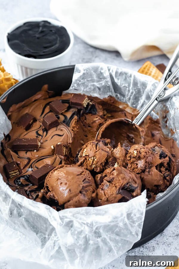 No-Churn Kit Kat Ice Cream no-churn chocolate ice cream loaded with chopped kit-kats and swirled with hot fudge sauce