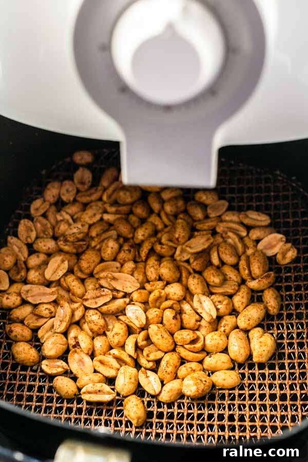 Crispy Homemade Air-Fried Peanuts Recipe 2 Roasted peanuts in an Air Fryer. They are golden brown and crunchy in less than 15 minutes. Serve as a snack or use in your recipes. You can store them for a long time.