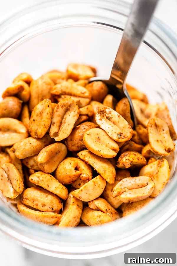 Crispy Homemade Air-Fried Peanuts Recipe 11 Roasted peanuts with taco seasoning in a glass jar. The peanuts are made in an Air Fryer in less than 15 minutes.