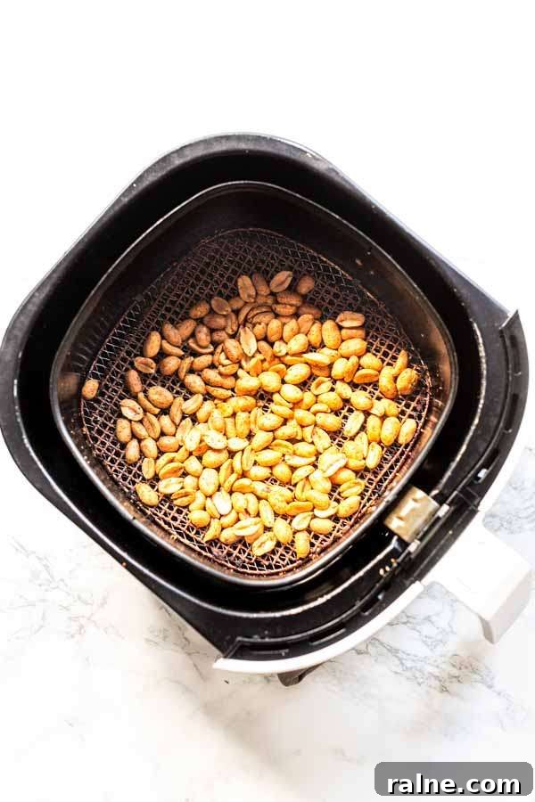 Crispy Homemade Air-Fried Peanuts Recipe 10 Golden brown peanuts in an Air Fryer. Ready in less than 15 minutes.