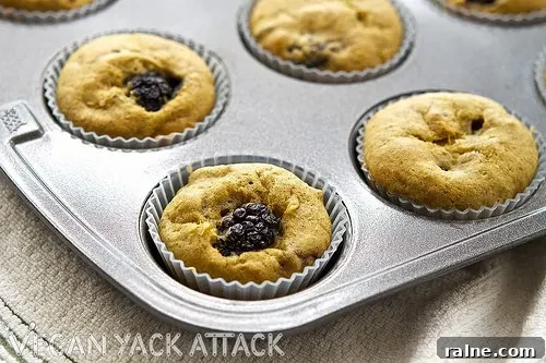 Moist mango blackberry muffins with occasional crunches of pistachios are great for breakfast or a snack! Vegan, soy-free