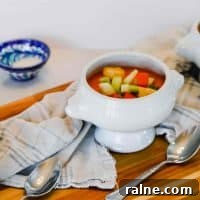 Authentic Gazpacho: Refreshing Cold Spanish Tomato Soup 6 3 white bowls filled with Gazpacho, a cold soup from Spain