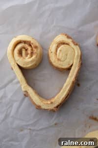 strip of dough partially rolled from each side