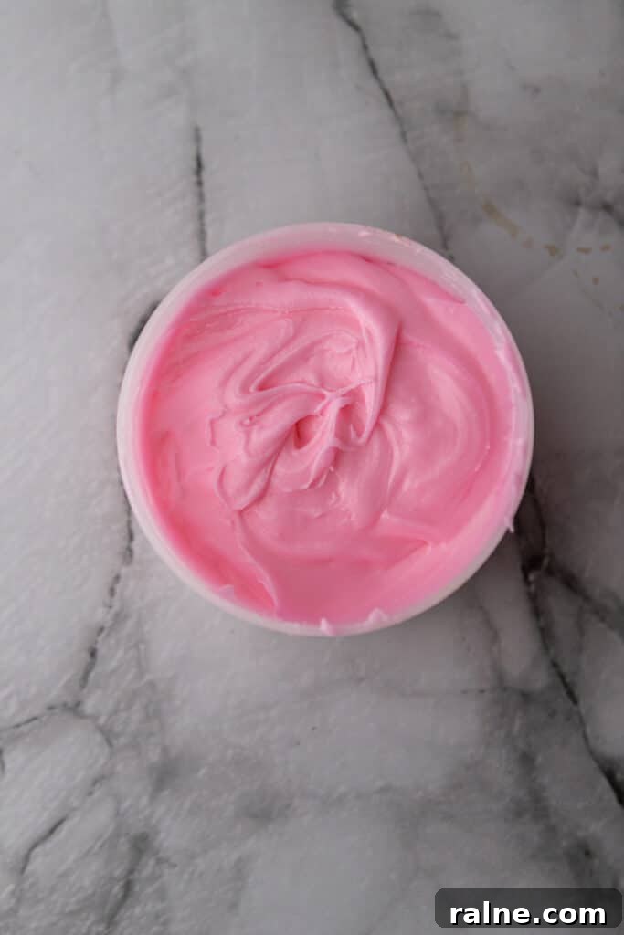 Pink icing mixed and ready for frosting