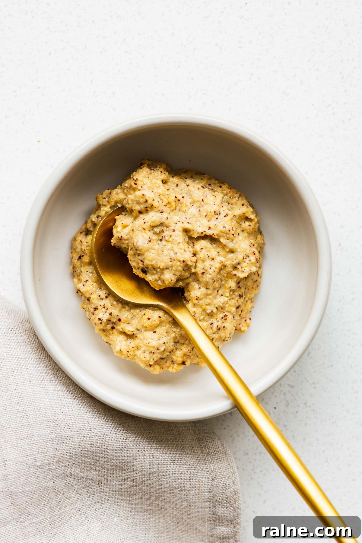 Dijon Mustard Substitutes and Simple Homemade Recipe 5 A bowl of Dijon mustard made from ground mustard seeds, white wine vinegar and salt.