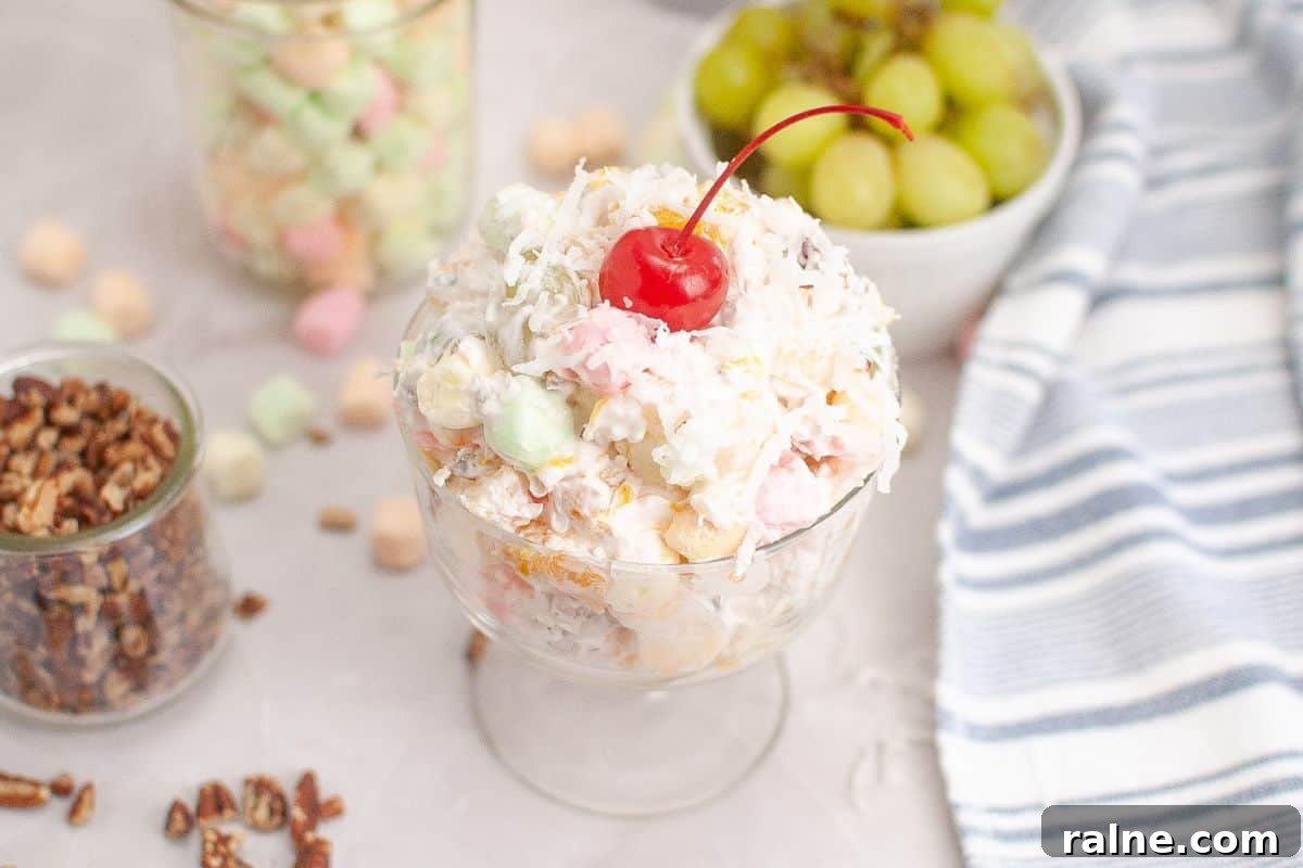 23 Make-Ahead Salads That Stay Fresh in the Fridge and Lunch Bag 19 A colorful Ambrosia Salad beautifully arranged in a serving bowl.