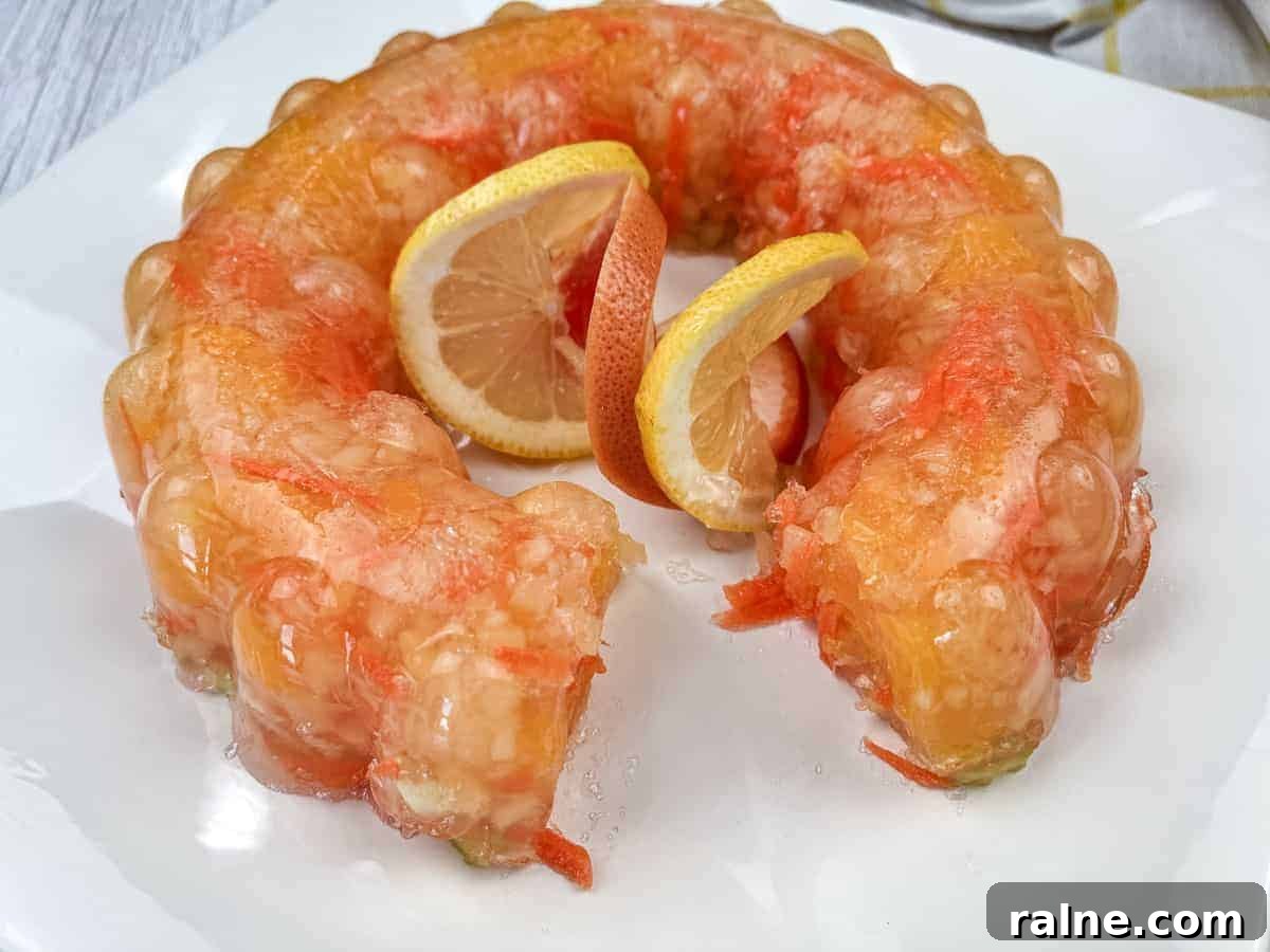 23 Make-Ahead Salads That Stay Fresh in the Fridge and Lunch Bag 20 Sunshine salad with slices of oranges in the center served on a white plate.