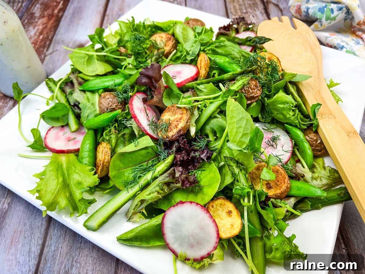23 Make-Ahead Salads That Stay Fresh in the Fridge and Lunch Bag 23 Spring salad with asparagus and potatoes on a white plate.