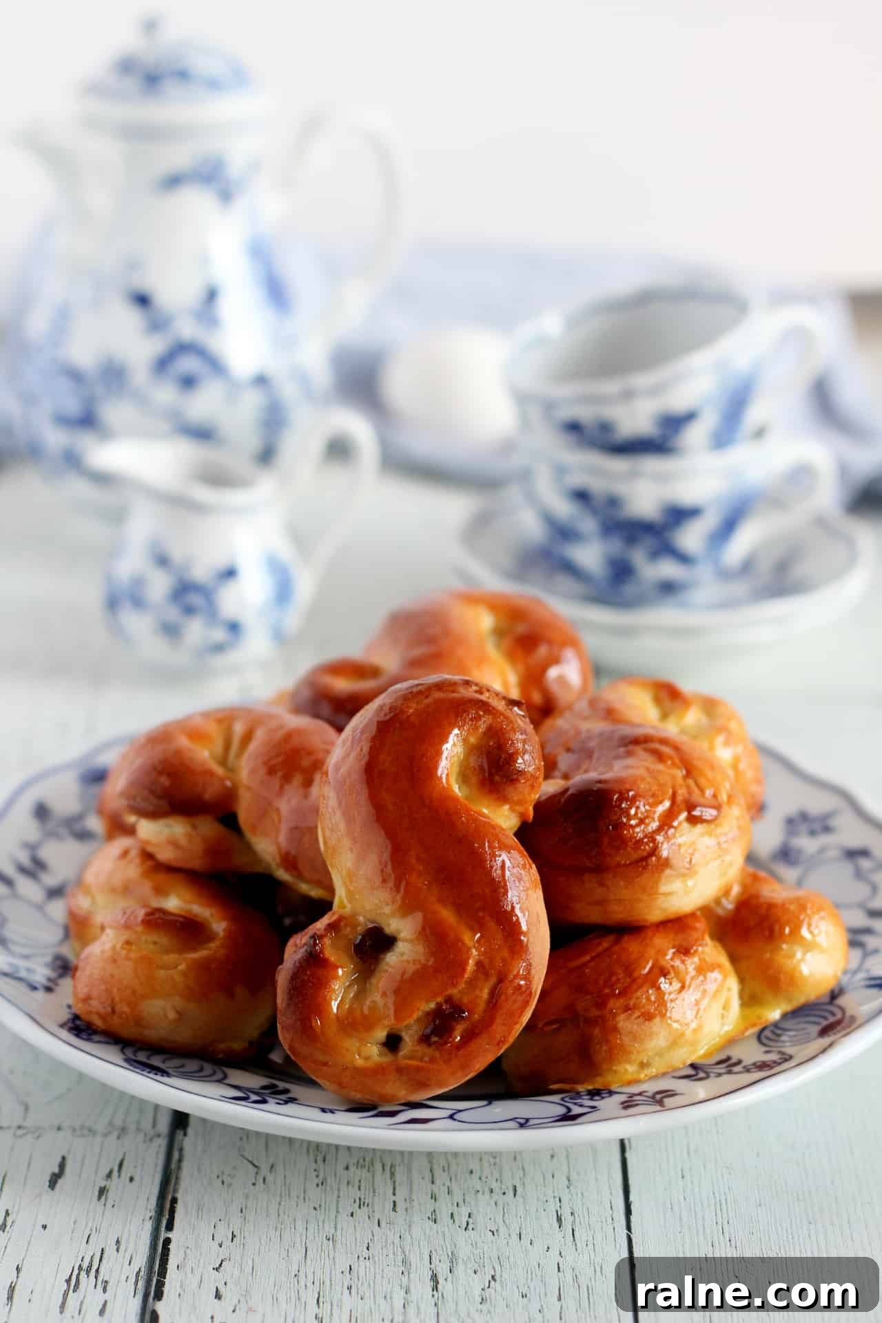 Easter Sweet Brioche Buns (Judas Ropes) 2 easter sweet brioche bun on plate