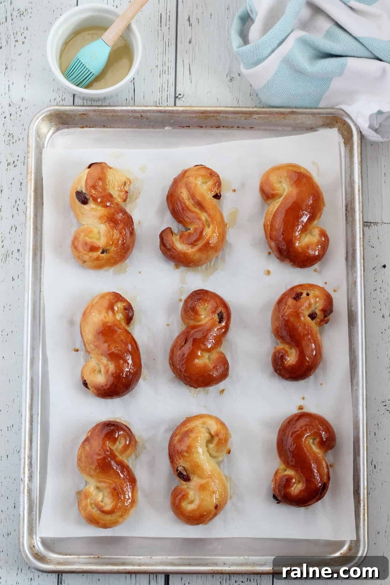 Easter Sweet Brioche Buns (Judas Ropes) 4 baked pastry on baking sheet